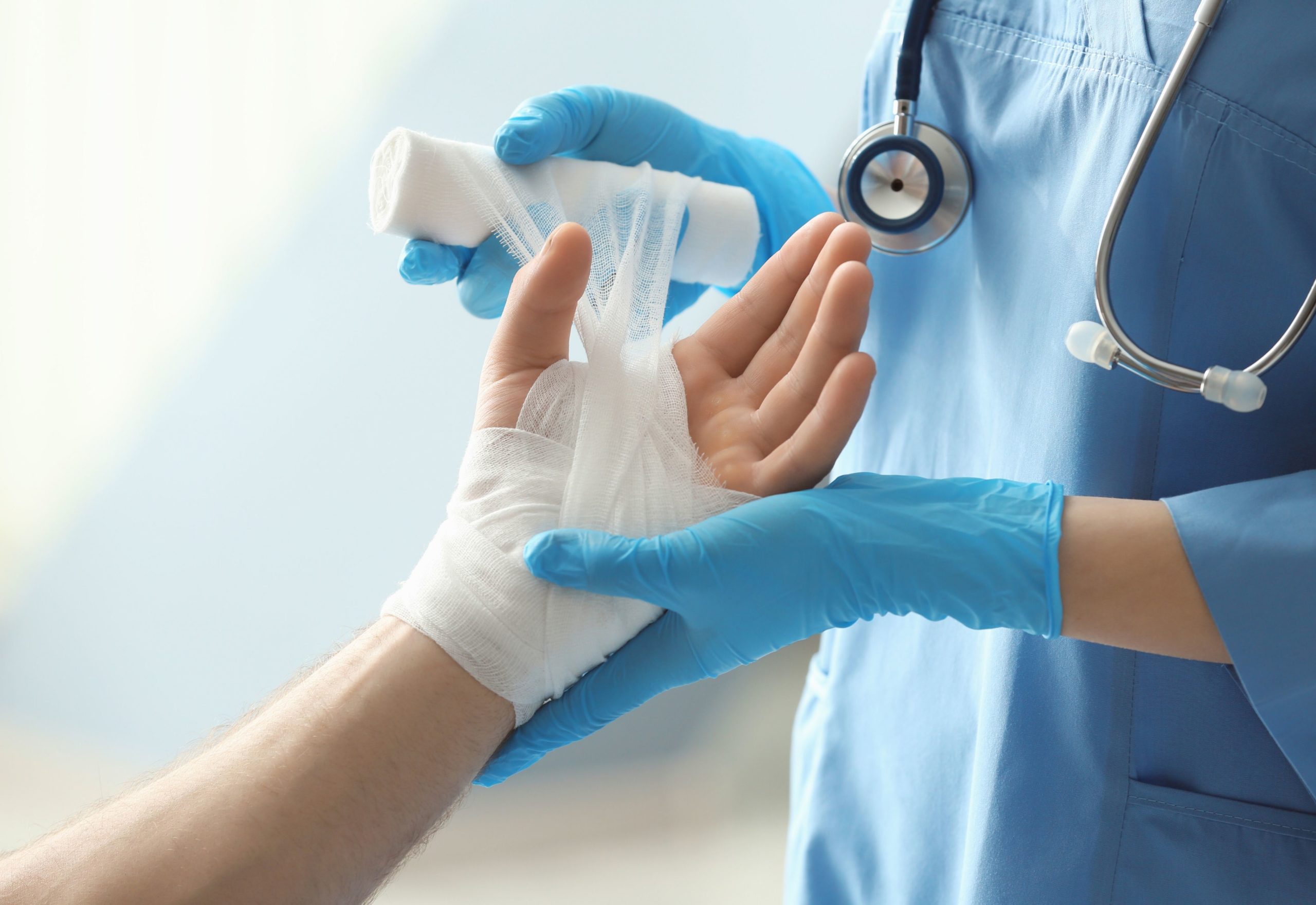 Medical professionals treating an injury