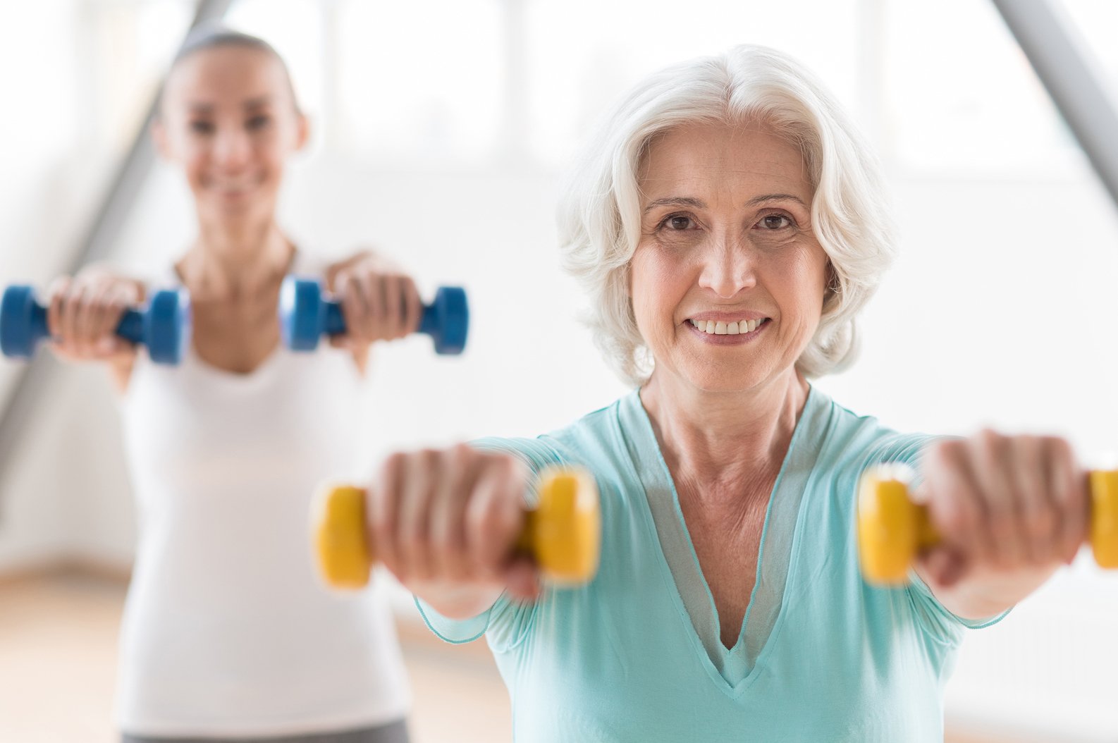 elderly person doing shoulder exercises