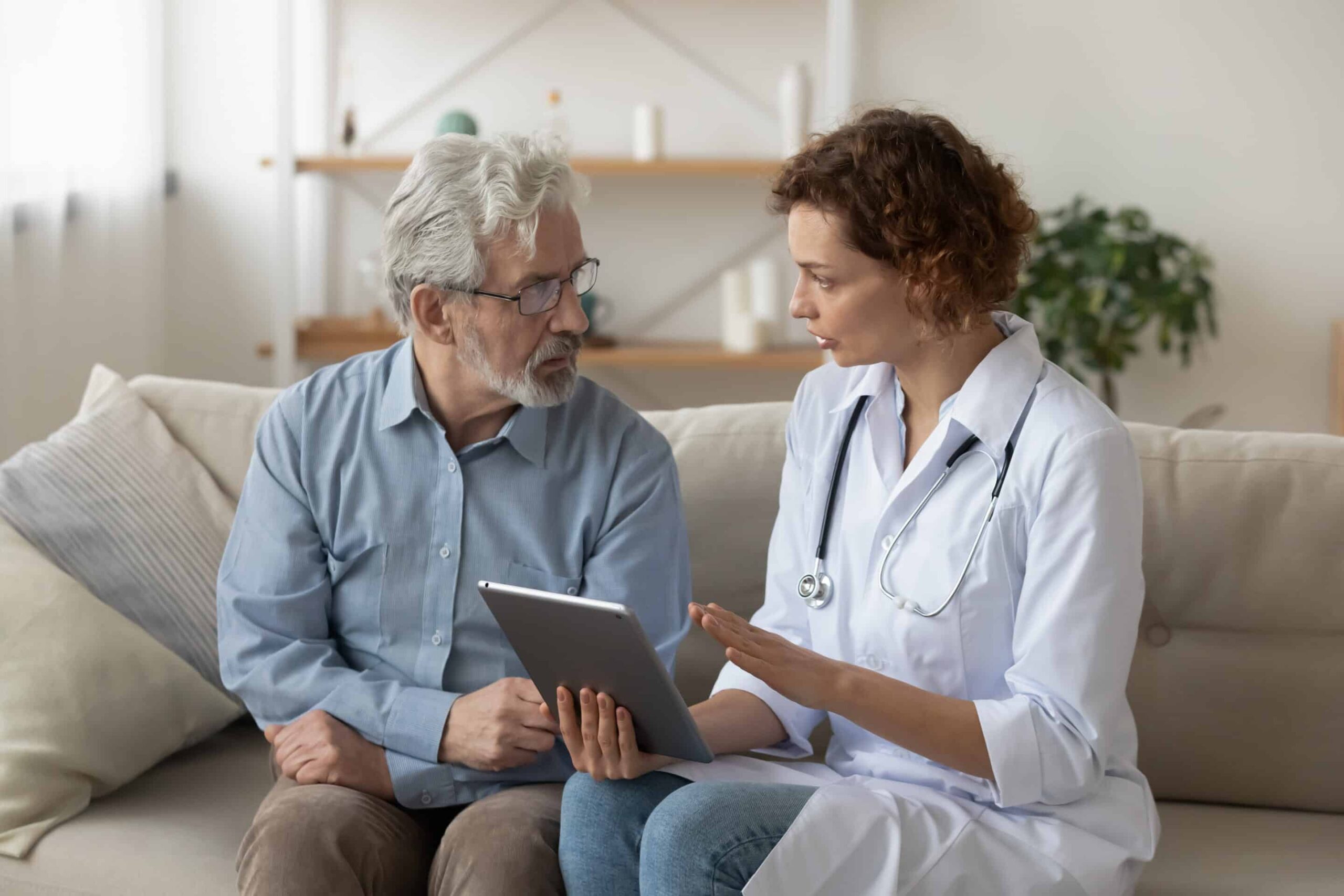 patient discussing an exercise plan with a healthcare provider