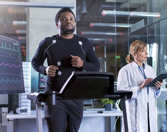 Man on treadmill with dr Man on treadmill with dr
