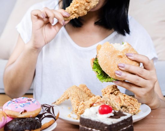 woman overeating woman overeating