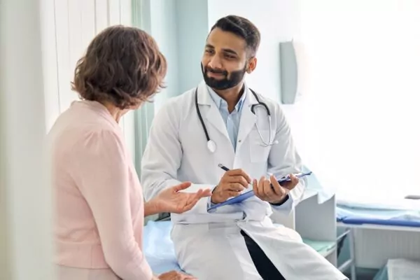 Triathlon Injury Treatment and Support in Austin 37 patient and doctor discussing